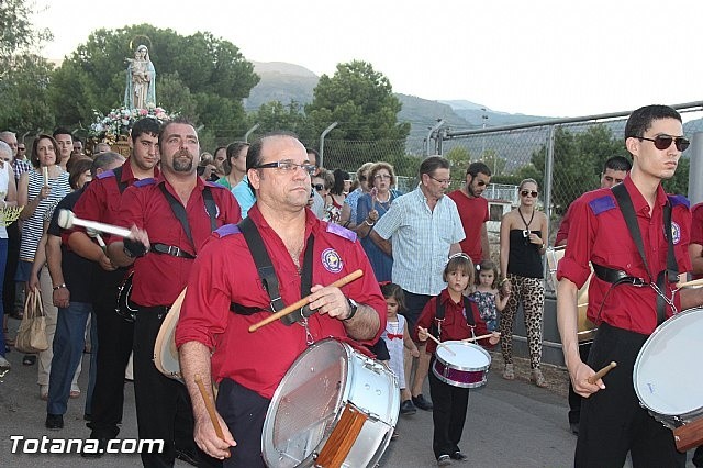 PARTICIPACIÓN DE LA BANDA EN LA PROCESIÓN DE LAS FIESTAS DE 