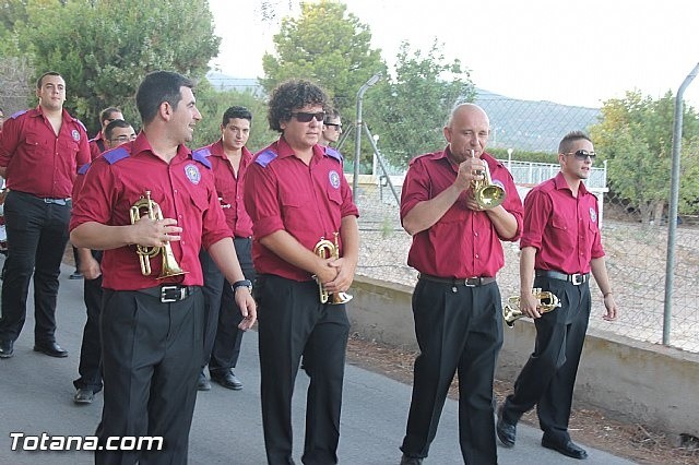 PARTICIPACIÓN DE LA BANDA EN LA PROCESIÓN DE LAS FIESTAS DE 