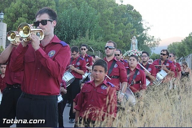 PARTICIPACIÓN DE LA BANDA EN LA PROCESIÓN DE LAS FIESTAS DE 