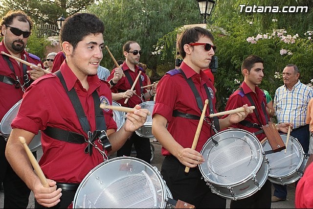 PARTICIPACIÓN DE LA BANDA EN LA PROCESIÓN DE LAS FIESTAS DE 