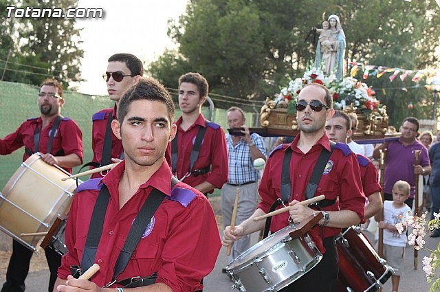 PARTICIPACIÓN DE LA BANDA EN LA PROCESIÓN DE LAS FIESTAS DE 