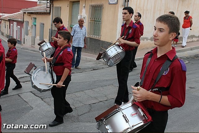 PARTICIPACIÓN DE LA BANDA EN LA PROCESIÓN DE LAS FIESTAS DE 