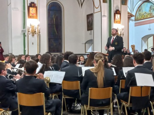 La Banda de Música de la Hdad. de San Juan Evangelista ofreció un concierto en la parroquia de las Tres Avemarias