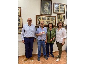 Entrega del premio de la rifa